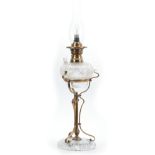 AN ART NOUVEAU BRASS AND CUT GLASS OIL LAMP having unusual hobnail cut vessel with refill plug