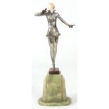JOSEF LORENZL. AN ART DECO COLD-PAINTED SILVERED-BRONZE AND IVORY SCULPTURE formed as a dancer