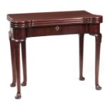 A GEORGE II MAHOGANY TRIPLE TOP FOLD OVER TABLE having a tea table and baize card table with