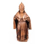 AN EARLY 15TH / 16TH CENTURY CARVED FRUITWOOD FIGURE OF A POPE 113cm high.
