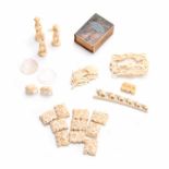 A COLLECTION OF 19TH CENTURY CARVED MINIATURE IVORY PIECES including a belt buckle, a floral