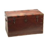 A 19TH CENTURY COLONIAL ANGLO INDIAN TEAK OFFICERS TRUNK having brass mounted corners and double-