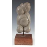 A MODERNIST STONE SCULPTURE mounted on a wooden base - signed 35cm high.