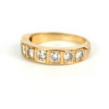 AN 18CT YELLOW GOLD AND DIAMOND ETERNITY RING having an eight diamond set band, app. 6.3g