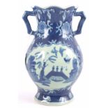 A CHINESE BLUE AND WHITE BULBOUS VASE 24cm high.