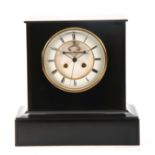 A 19TH CENTURY FRENCH LARGE BLACK SLATE MANTEL CLOCK with platform base and white enamel dial with