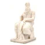 AN EARLY 20TH CENTURY CARVED WHITE MARBLE SCULPTURE OF MICHAELANGELO'S MOSES - unsigned 44cm high.