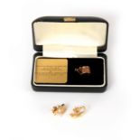 TWO PIECES OF GOLD JEWELLERY a 9ct gold charm produced for the Mustard Shop, Norwich in a