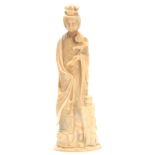 A LATE 19th CENTURY CHINESE IVORY SCULPTURE modelled as Guanyin with buddha crown 24.5cm high