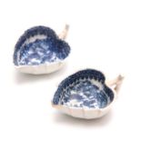 AN EARLY PAIR OF BLUE AND WHITE LEAF SHAPED PEARLWARE PICKLE DISHES with oriental landscape