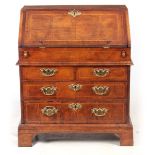 A LATE 17TH/EARLY18TH CENTURY HERRINGBONE STRUNG CROSSBANDED FIGURED WALNUT BUREAU OF SMALL SIZE the
