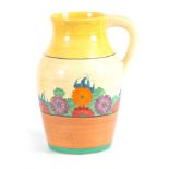 A 1930'S CLARICE CLIFF GAY DAY PATTERN LOTUS JUG bearing bizarre back stamp 31cm high 22cm wide