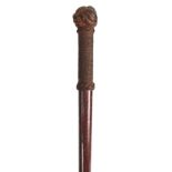A 19th CENTURY SAILORS WALKING CANE the handle formed as a woven handle with Turk's head knots and