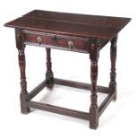 A GOOD 17TH CENTURY OAK SIDE TABLE OF SUPERB COLOUR AND PATINA having fruitwood medallions to each