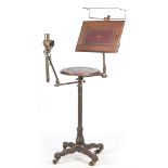 AN UNUSUAL 19TH CENTURY WALNUT AND CAST IRON ADJUSTABLE UNIVERSAL TABLE/ READING STAND BY J.
