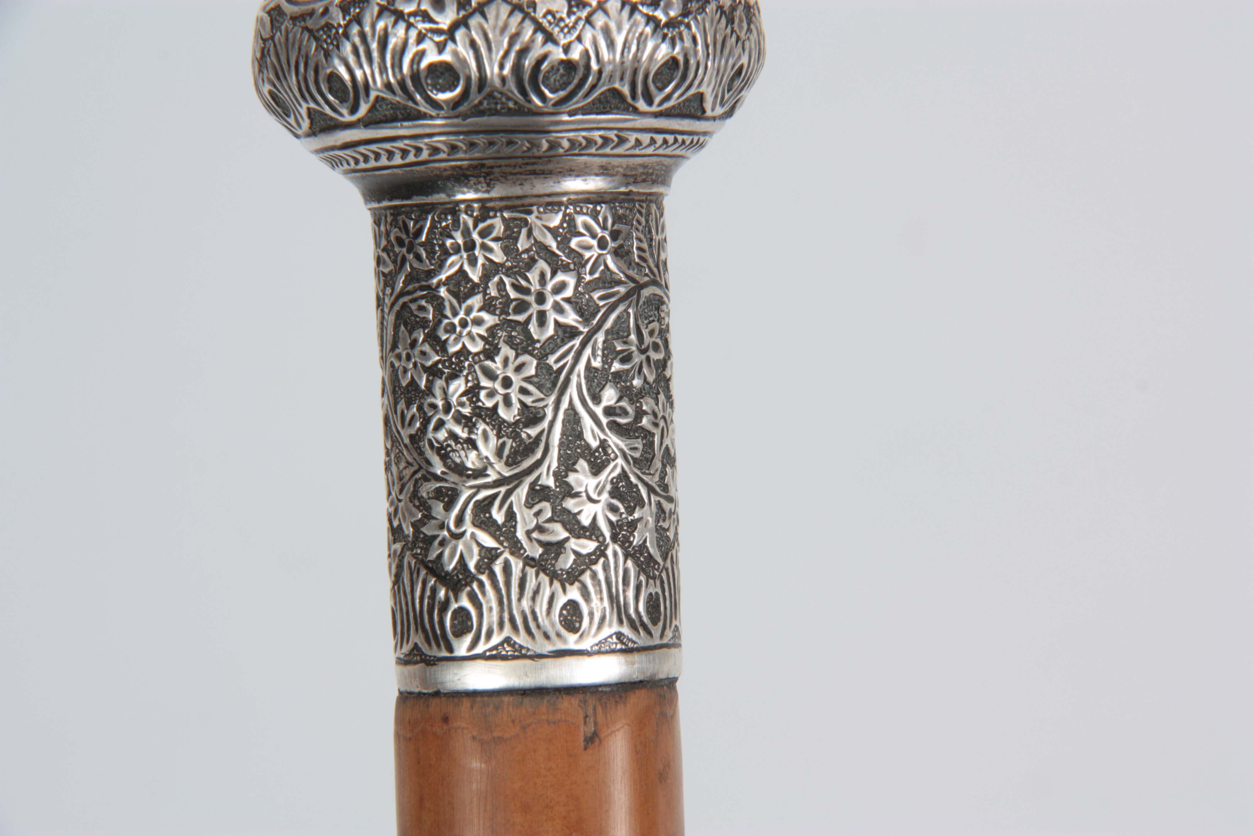 A 19TH CENTURY MALACCA AND WHITE METAL SWORD STICK with tapering cane shaft and floral repousse work - Image 2 of 6