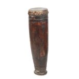 A 19TH CENTURY AFRICAN DRUM with goats skin top on a hollowed trunk wooden base 103cm high.