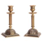 A PAIR OF 19TH CENTURY FRENCH BOULLE AND CONTRA BOULLE CANDLESTICKS with domed bases and reeded