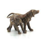 AN EARLY 20th CENTURY AUSTRIAN BRONZE SCULPTURE modelled as two gun dogs 5.5cm high, 11cm wide