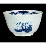 A FIRST PERIOD WORCESTER BLUE AND WHITE BOWL decorated fisherman panels on a fluted relief moulded