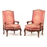 A FINE PAIR OF 18TH CENTURY FRENCH ROCOCO CARVED WALNUT OPEN ARMCHAIRS with upholstered shaped