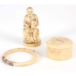 A 19th CENTURY JAPANESE IVORY OKIMONO 11cm, together with a Japanese ivory bangle decorated with