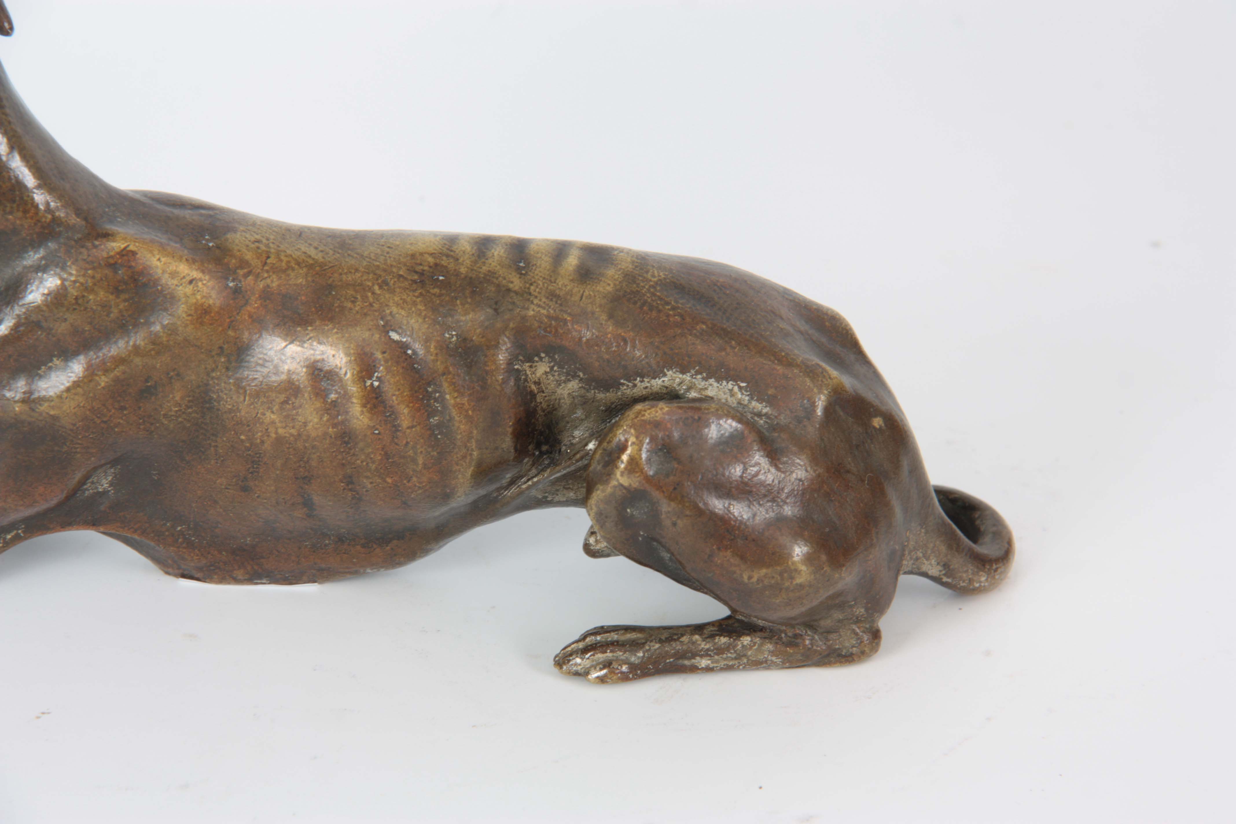 A LATE 19th CENTURY PATINATED BRONZE SCULPTURE modelled as a recumbent greyhound 26cm long - Image 4 of 6