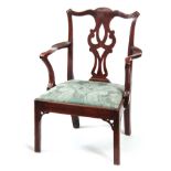 A GEORGE III CHIPPENDALE STYLE WALNUT COUNTRY OPEN ARMCHAIR with pierced shaped splat and splayed