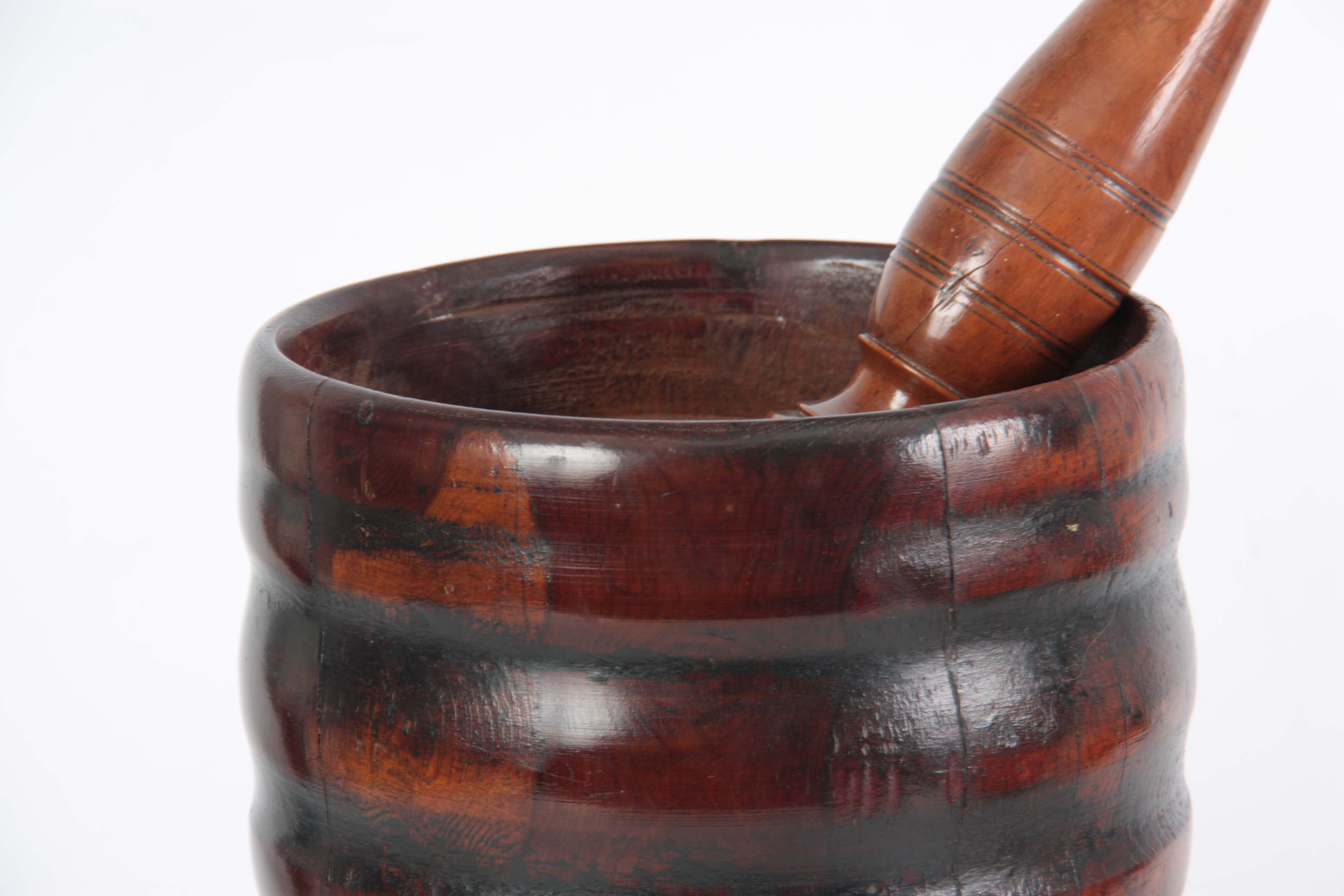 AN 18TH CENTURY YEW-WOOD PESTLE AND MORTAR of ribbed bulbous form with later Pestle 23cm high 20cm - Image 3 of 5