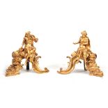 A PAIR OF FRENCH 19th CENTURY ORMOLU FIGURAL CHENETS modelled as classical figures seated on