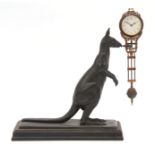 AN EARLY 20th CENTURY PATINATED METAL KANGAROO MYSTERY MANTEL CLOCK the kangaroo standing on