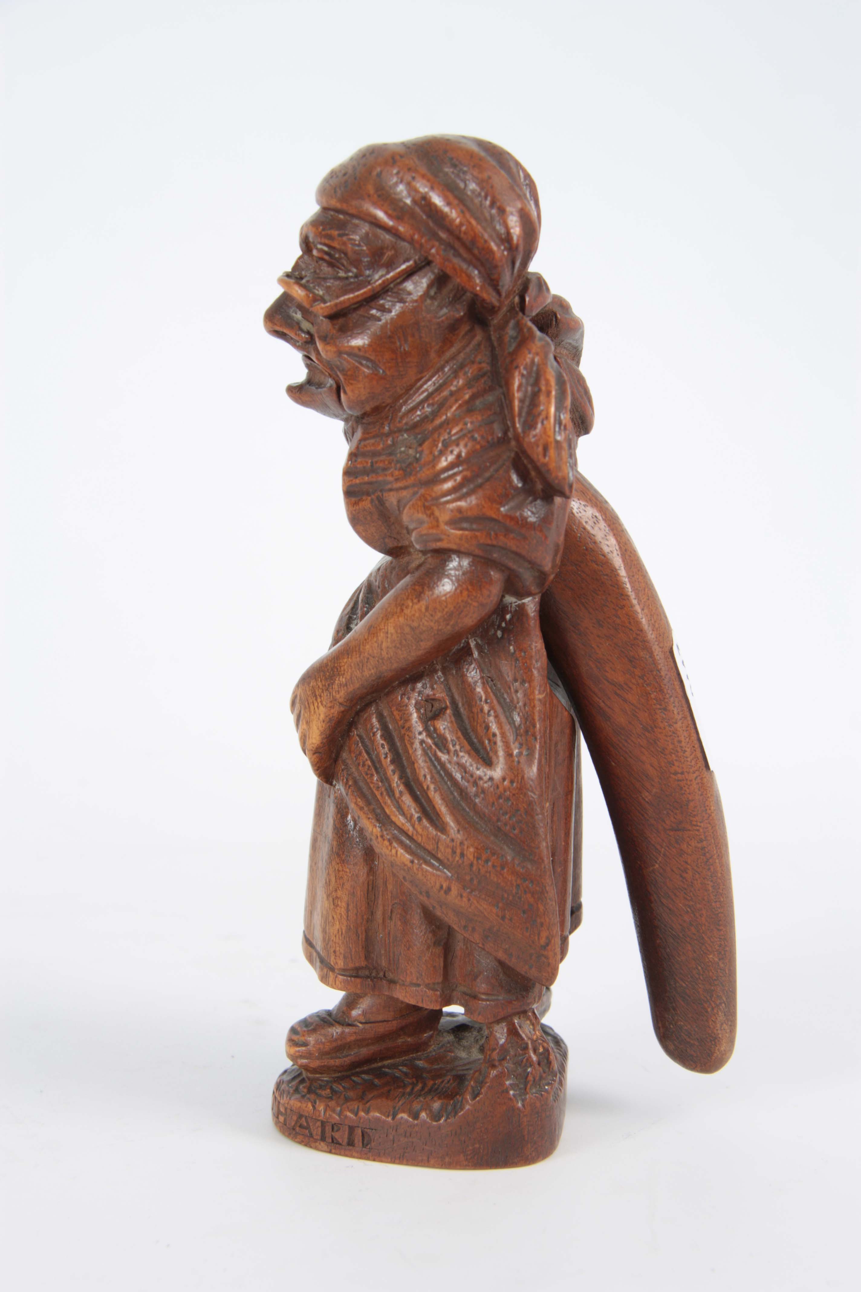 A LATE 19TH CENTURY SWISS BLACK FOREST NUTCRACKER formed as an old woman with headscarf and glasses, - Image 2 of 5