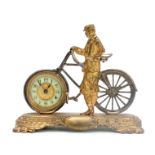 A LATE 19th CENTURY ENGLISH NOVELTY DESK CLOCK formed as a gilt well-dressed gentleman stood next to