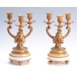 A PAIR OF 19TH CENTURY FRENCH ORMOLU AND MARBLE THREE BRANCH CANDELABRA with triple urn-shaped