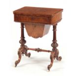 A VICTORIAN BURR WALNUT WORK / GAMES TABLE having hinged revolving top above a pull-out drawer and