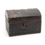 AN EARLY 18TH CENTURY DOME TOPPED LEATHER BOUND AND BRASS STUDDED TRUNK of small proportions