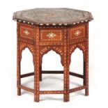 A 19TH CENTURY OCTAGONAL ANGLO INDIAN OCCASIONAL TABLE INLAID WITH BONE AND EBONY standing on a