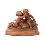 A 19th CENTURY TERRACOTTA FIGURE GROUP modelled as putti on oval plinth with beaded edge 39cm wide -