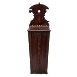 A GEORGE III MAHOGANY AND FRUITWOOD CANDLE BOX with reeded edge moulded tapering front and carved