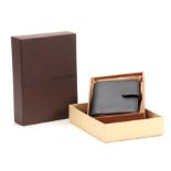 A LOUIS VUITTON GRAINED BLACK LEATHER FOLDING DIARY for 2014 with sprung ring holders 14.5by18cm -