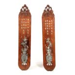 A PAIR OF LATE 19th CENTURY CHINESE HARDWOOD AND MOTHER-OF-PEARL INLAID WALL PLAQUES having floral