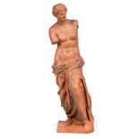 A TERRACOTTA SCULPTURE modelled as Venus di Milo 80cm high