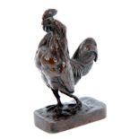 A 19TH CENTURY BRONZE SCULPTURE OF A COCKEREL having brown patination 14.5cm high.