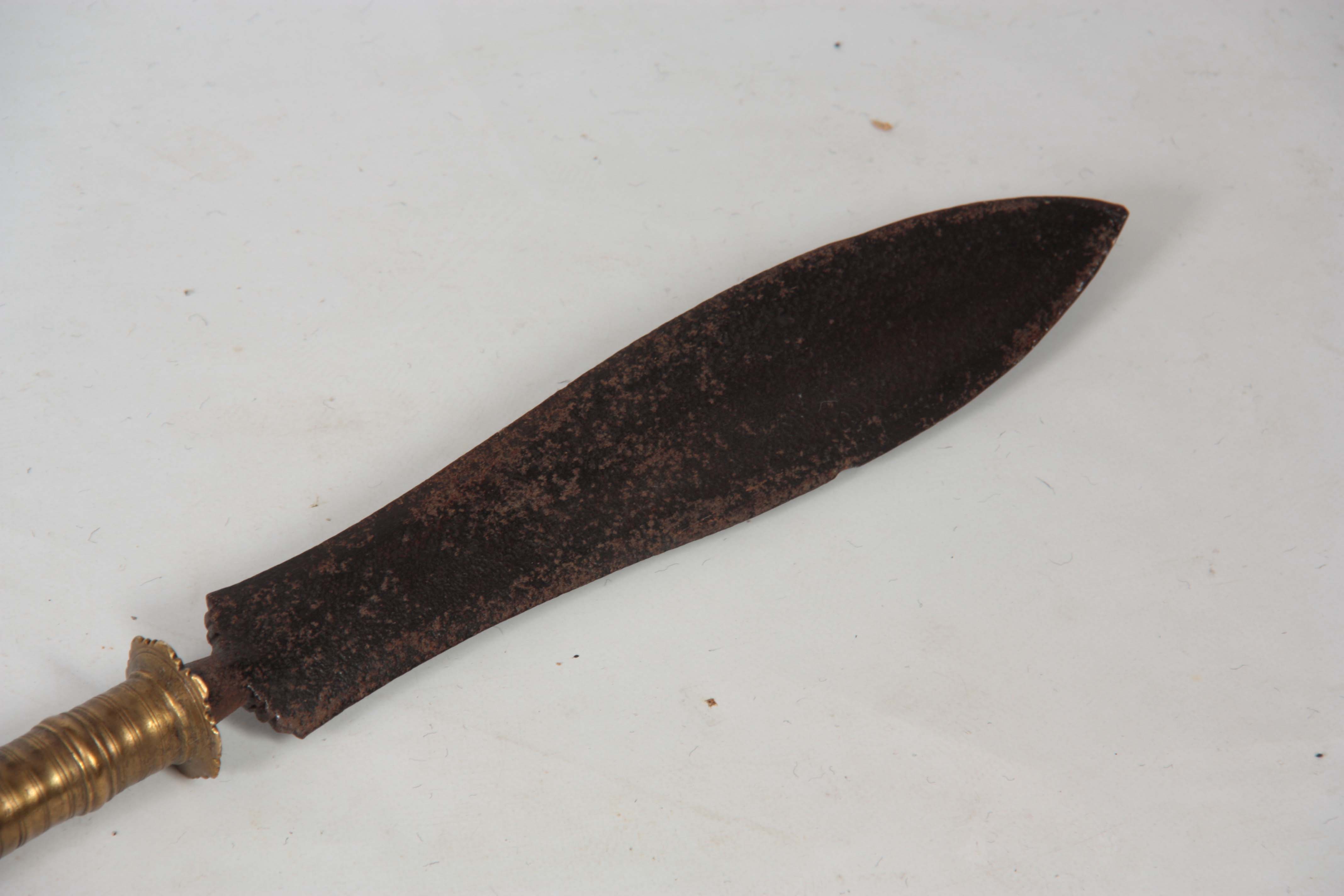 A 19TH CENTURY AFRICAN TRIBAL SPEAR with flattened iron blade and ringed brass shank on a heavy - Image 3 of 4