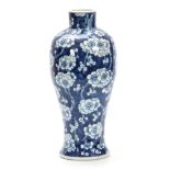 A 19TH CENTURY CHINESE BULBOUS VASE decorated with blossoming prunus flowers - having a four-
