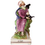 An early 19th Century Ralph Wood type pearlware polychrome FIGURE of ELIJAH modelled in a seated