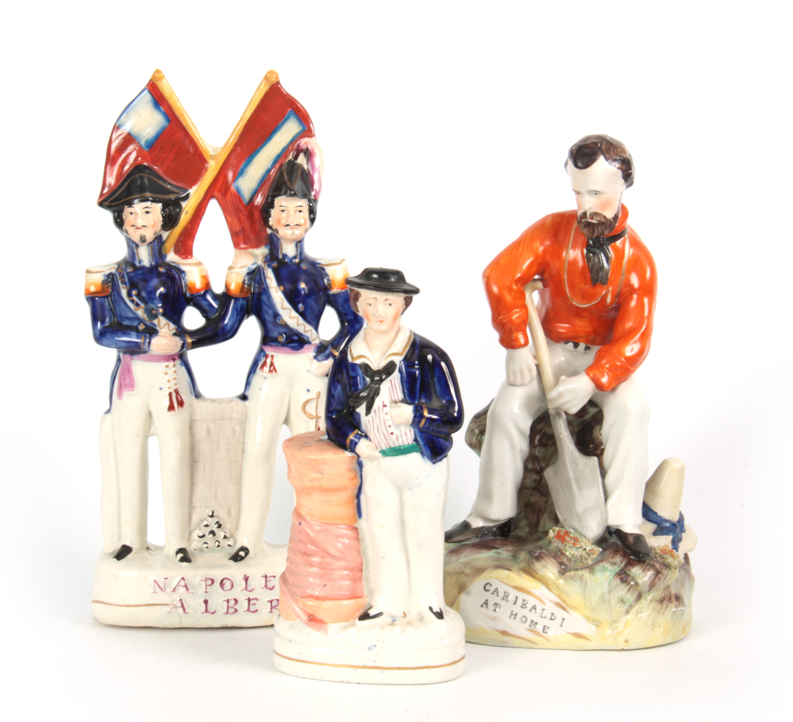 A SELECTION OF THREE 19TH CENTURY STAFFORDSHIRE FIGURES comprising Garibaldi at Home - 24cm high