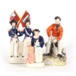 A SELECTION OF THREE 19TH CENTURY STAFFORDSHIRE FIGURES comprising Garibaldi at Home - 24cm high
