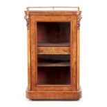 A VICTORIAN BURR WALNUT INLAID MUSIC CABINET with brass gallery above a hinged glazed door,