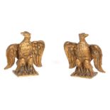 A PAIR OF 19TH CENTURY GILT BRONZE EAGLES 12cm wide 14.5cm high.